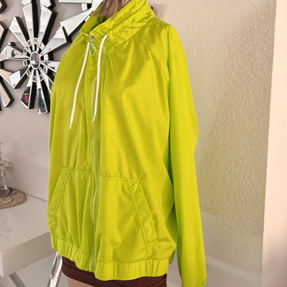 Unisex rain jacket neon green color size XL never worn